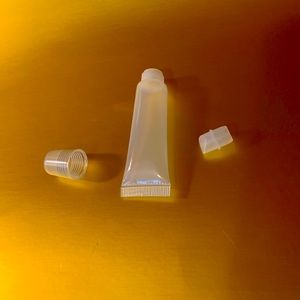 10 New Unused Empty Lipgloss Tube  Containers. 10ml in size.